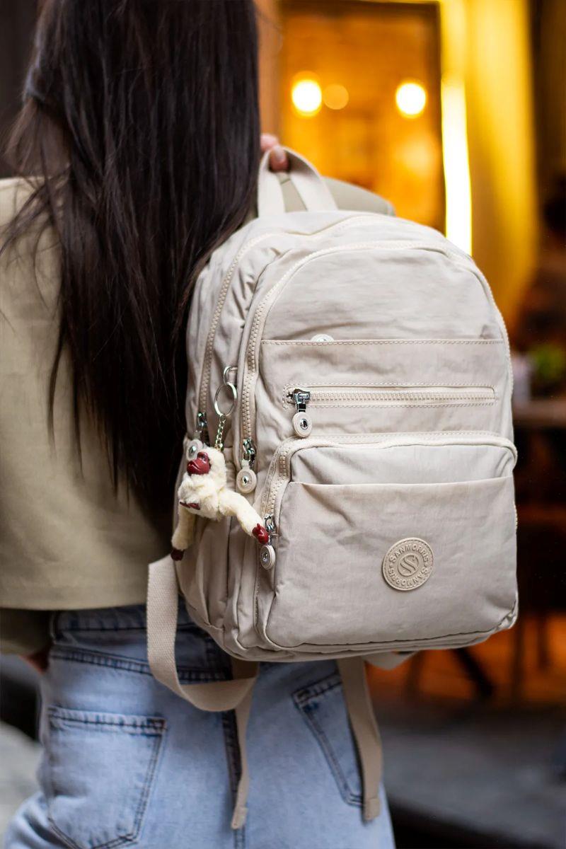 Sanmorris Unisex Suya Dayanıklı Kumaş Çok Gözlü Laptop Bölmeli Orta Boy Seyahat ve Okul Çantası KREM